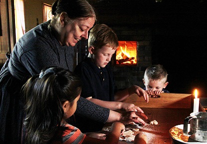 Black Creek Pioneer Village interpreter presents a baking demonstration for school children