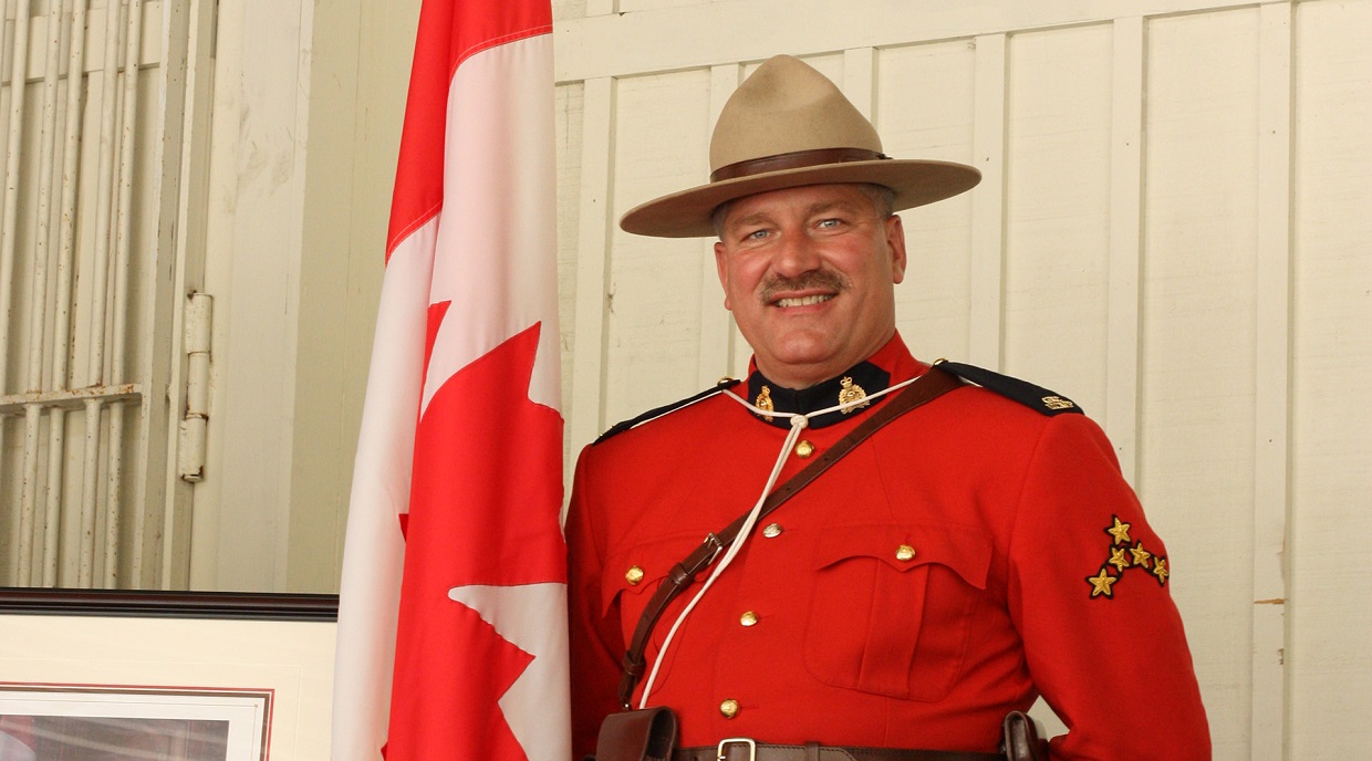 a Mountie stands on guard at the Black Creek Pioneer Village Canada Day celebration