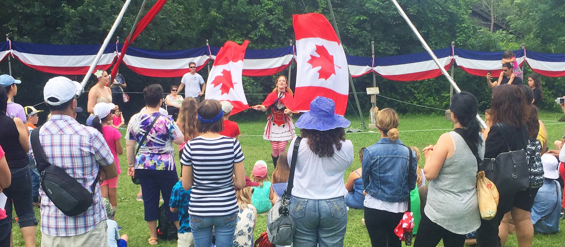 performer entertains a crowd at the Black Creek Pioneer Village 2017 Canada Day celebration