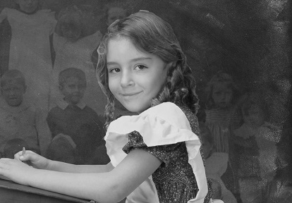 19th century school girl at desk