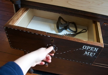 visitor explores Flynn House exhibit at Black Creek Pioneer Village