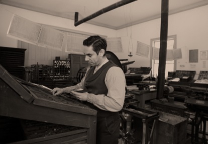 typesetter works in printing office