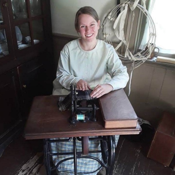 dressmaker with sewing machine