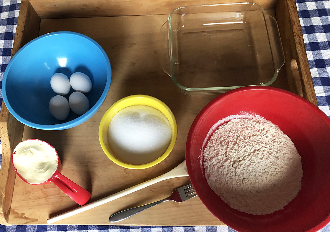 supplies and ingredients for preparing a Victorian cup cake