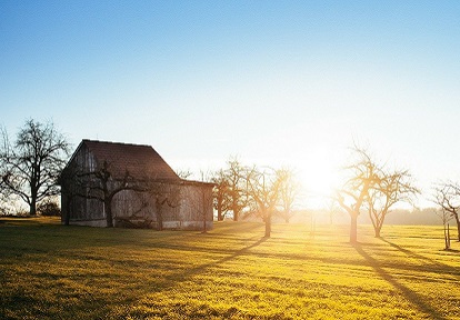 small farm house at sunrise