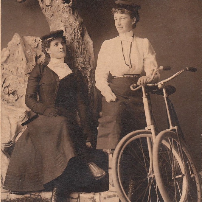 turn of the century photograph of young women dressed for cycling