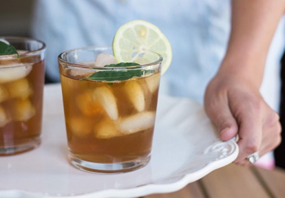 glasses of homemade soda pop with lemon slices