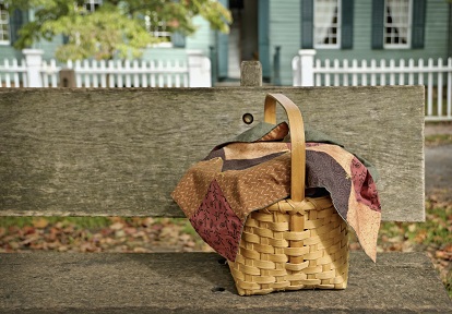 food basket on a bench outside historic home at Black Creek Pioneer Village