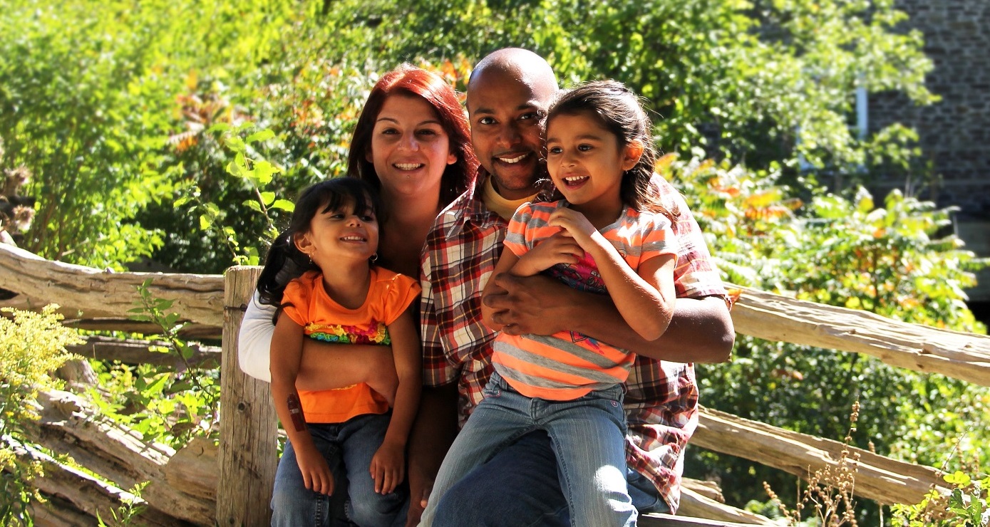 young family enjoys a summertime visit to Black Creek Pioneer Village