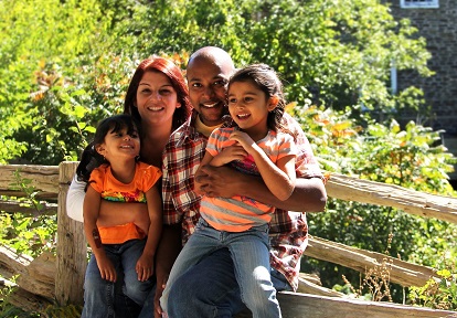 young family enjoys a summertime visit to Black Creek Pioneer Village