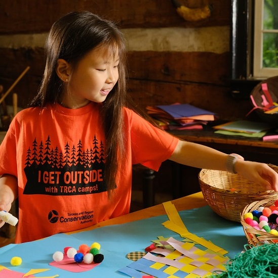 summer camper makes crafts at Black Creek Pioneer Village