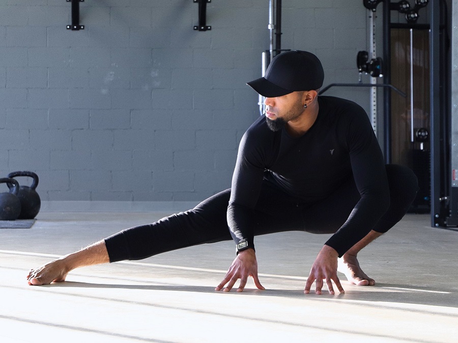 Flow Body workshop instructor demonstrates an animal flow pose